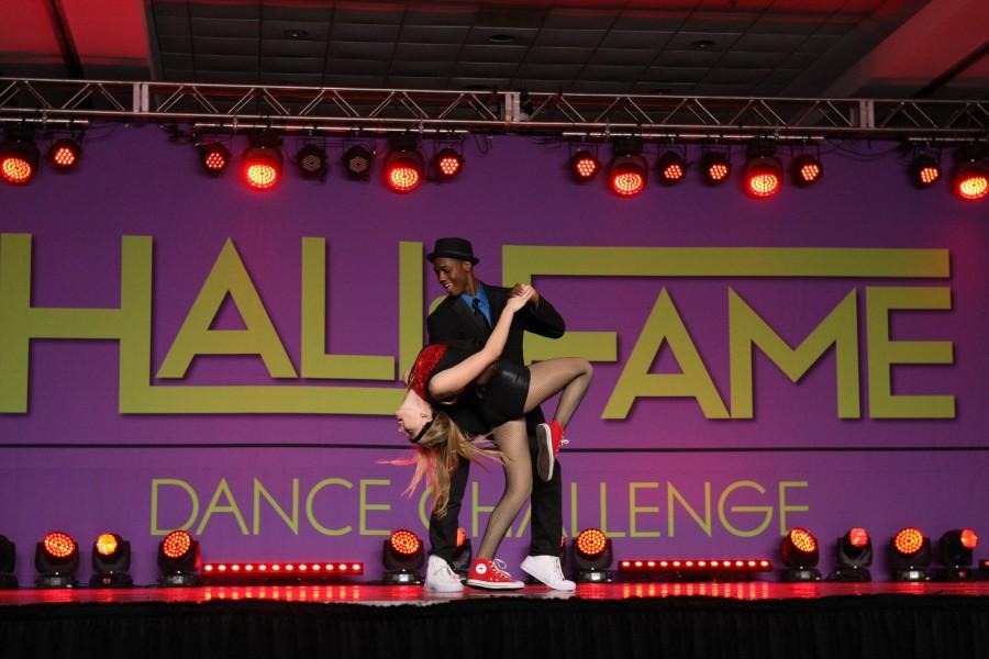 Mark Auger performs a duet on stage at the Hall Of Fame Dance Competition.