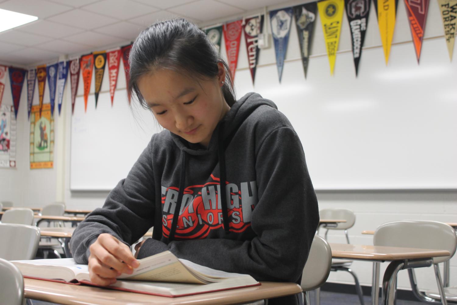 Senior Emily Wang moved to Troy in middle school from China and had to learn English.