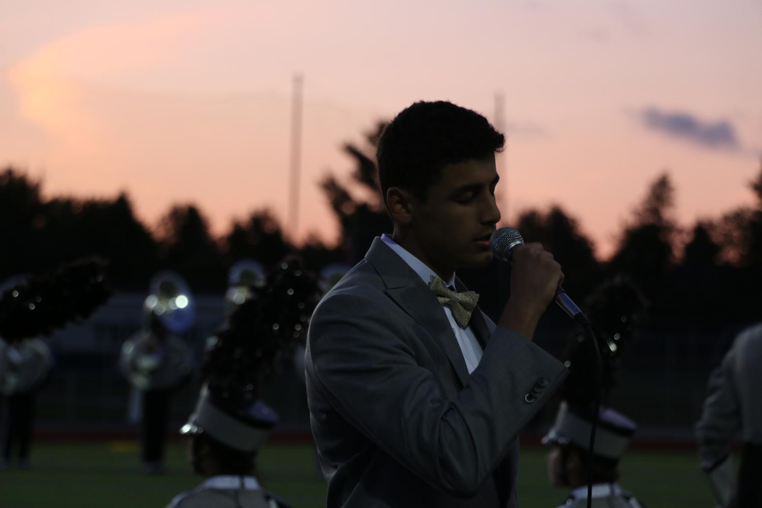 Junior Kulin Oaks sings Beautiful by Christina Aguilera for the marching band halftime show. 