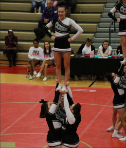 The cheer team competes at Athens High School.