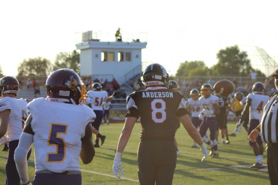 Junior Blake Anderson walks onto the field during the Colts game against Avondale on Aug. 23.
