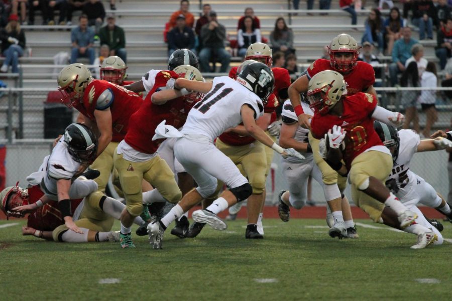 Troy High competes against Athens High at a season game.