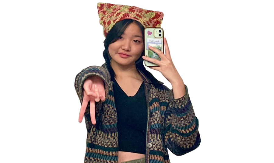 Photo cutout of Journalist Ashley Park modeling her cute cat hat!